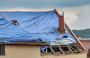 The Work That Happens Between Tarp and New Roof
